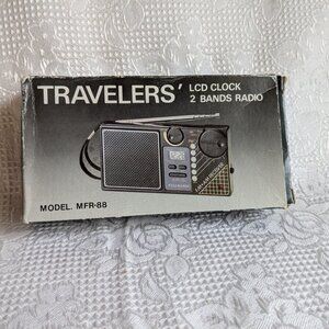 Travelers' Portable Clock Radio Battery Powered
